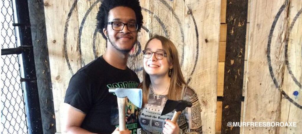 Couple preparing to do ax throwing
