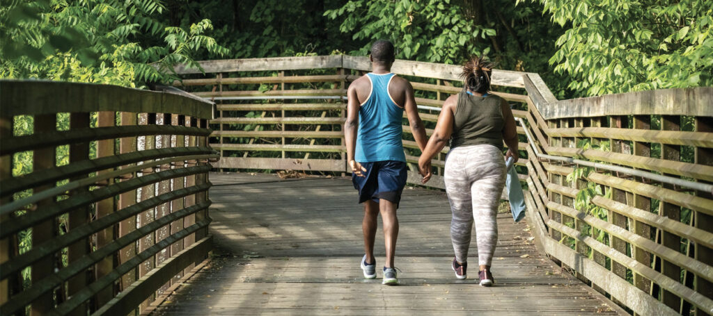 Couple walking on Murfreesboro Greenway Trail